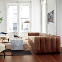 Ensemble de meubles de salon, canapé et fauteuils en cuir marron, structure en bois, design italien moderne vintage.