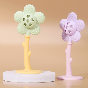 Mordedor de silicona con forma de girasol para bebés de 0 a 24 meses, juguete suave con función de sonajero - Product Image 1