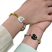Bracelet perlé pour femme motif tête de chat de dessin animé, mignon et enfantin, noir et blanc