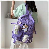 2022 à la mode dessin animé poupée designer logo personnalisé adolescent cartable livre sacs décontracté sacs d'école femmes sac à dos pour collège fille