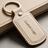 Porte-clés en métal et cuir PU tendance, gravure personnalisée, vente en gros, cadeau d'entreprise pour hommes