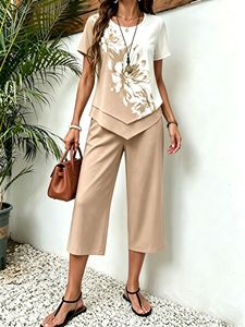 Conjunto de 2 piezas con estampado floral de nueva moda para mujer, top de manga corta con dobladillo asimétrico + pantalones cortos, conjunto informal de verano - Product Image 2