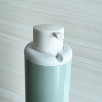 Flacon pompe airless rotatif en acrylique cylindrique de 30 ml avec collier en ABS pour emballage cosmétique