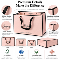 Sacs en papier de luxe personnalisés roses avec logo, poignées en ruban noir, sacs de shopping de luxe pour les boutiques de vêtements, les cosmétiques et les marques de cadeaux