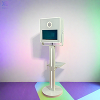 Xingruijia XRJ 2026 Photomaton ovale en métal avec écran tactile 15,6 pouces, conception étanche, ventilateur de refroidissement RGB, impression en libre-service