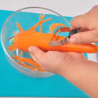 Creatieve handmatige keukenhulp van roestvrij staal, professionele snijder en schiller voor groenten, aardappelen en fruit