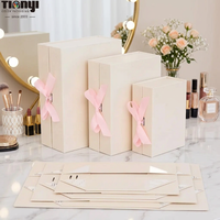 Boîte cadeau pliable magnétique biodégradable avec logo personnalisé, papier blanc gaufré et ruban satiné pour cosmétiques et Saint-Valentin