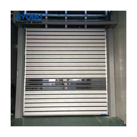 Puerta espiral automática de aluminio pesado, hermética, aislada, para talleres eficientes