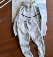 Ensemble de survêtement personnalisé pour homme avec blocs de couleur, veste à fermeture éclair intégrale et pantalon de jogging, coupe décontractée, vêtements de sport, fournisseur OEM ODM en gros B2B