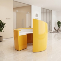 Comptoir de réception personnalisé multifonctionnel en pierre de surface solide jaune, design cylindrique, avec logo