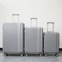 Ensemble de bagages en matériau PC personnalisable en usine, valise à roulettes durable avec roues pivotantes pour les voyages en extérieur
