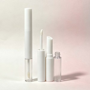 หลอดลิปบาล์มแบบสองหัวทรงเพรียวบาง ภาชนะลิปกลอสเปล่าพร้อมหัวแปรง หลอดลิปสติกพลาสติกแบบคู่ สำหรับบรรจุภัณฑ์เครื่องสำอาง - Product Image 1