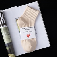 Chaussettes de sport esthétiques en coton côtelé, couleur unie, avec logo personnalisé, certifiées OEKO Tex100, pour streetwear minimaliste et athlétisme