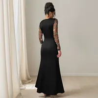 Robe élégante unie à manches longues et coupe ajustée, brodée, avec ourlet asymétrique, idéale pour les événements printemps-automne
