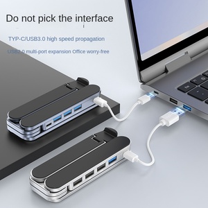 Support pliable et portable pour ordinateur portable avec hub USB 3.0 et cadre rehausseur en alliage d'aluminium - Product Image 1