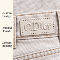 Écussons en cuir personnalisés OEM ODM pour vêtements et chapeaux, étiquettes en cuir PU avec logo gaufré à coudre sur les jeans et les vêtements
