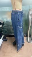 Celana Jeans Wanita Eropa Amerika 2026 Bordir Bunga Model Kaki Lebar Pinggang Tinggi Ujung Raw Fringe Panjang Menyentuh Lantai Gaya Street Style
