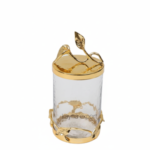 Bote decorativo de lujo con plataforma dorada, nuevo diseño de hoja con tapa de metal martillado de vidrio, a la venta - Product Image 1