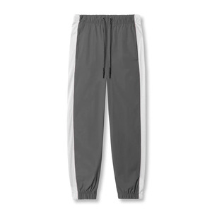 <span class=keywords><strong>Pantaloni</strong></span> da uomo Oversize all'ingrosso <span class=keywords><strong>bianchi</strong></span> <span class=keywords><strong>con</strong></span> <span class=keywords><strong>pantaloni</strong></span> in bianco <span class=keywords><strong>con</strong></span> maglia laterale in bianco per la moda e lo sport - Product Image 6