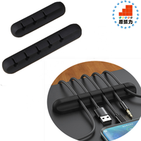 Organisateur de câbles USB mural et de bureau en silicone noir avec clips enrouleurs et support de gestion des câbles
