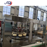 Machine de remplissage de liquides à pompe à engrenages multi-têtes d'occasion pour eau, jus, lait, vin, bière, sauce, en acier inoxydable, à bas prix, en stock