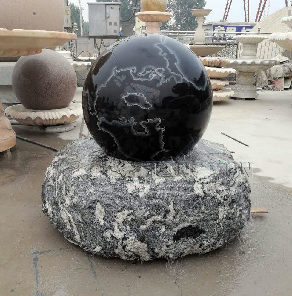 屋外庭園用黒御影石大理石球体回転噴水、モダンなデザインと高度に磨
