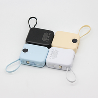 Cadeaux promotionnels Mini Power Bank 10000mAh PD 22.5W Charge rapide Powerbank portable avec 2 câbles intégrés et écran LED