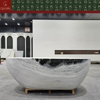 Baignoire ovale autoportante en marbre blanc Panda GOLDKING, design contemporain, veinure noire audacieuse, polissage CNC OEM, sur mesure