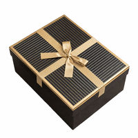 Boîte cadeau personnalisée noire et or à fines rayures, emballage de luxe avec ruban pour produits de détail, marques en gros