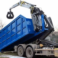 Grue de chargement avec benne à grappin pour benne à conteneurs