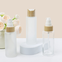 Botol Pompa Kosmetik Kaca Buram 30ml-120ml Custom Grosir dengan Tutup Bambu untuk Serum Perawatan Kulit dan Semprotan Kabut