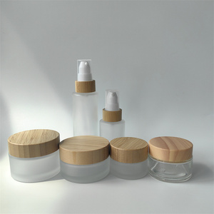 Nouveau vide 50g crème bouteille de <span class=keywords><strong>ponçage</strong></span> cosmétique pressage émulsion Split Essence bocal en verre droite couverture en <span class=keywords><strong>bois</strong></span> massif sérigraphie - Product Image 1