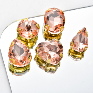 Petits strass en forme <span class=keywords><strong>de</strong></span> griffe <span class=keywords><strong>de</strong></span> pêche cousus à la main, à dos plat, en verre, pour robes <span class=keywords><strong>de</strong></span> mariée, chapeaux, nail art, robes <span class=keywords><strong>de</strong></span> soirée, accessoires <span class=keywords><strong>de</strong></span> <span class=keywords><strong>bijoux</strong></span> DIY - Product Image 1