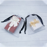 Vente en gros Pochette à bijoux de luxe en organza avec cordon de serrage Cadeau de Noël Sac cadeau d'anniversaire Pochette d'emballage en organza