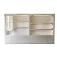 Vitrine à bijoux rectangulaire minimaliste de luxe en or et blanc avec un design d'éclairage LED élégant pour les centres commerciaux