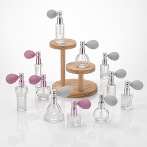 Botella de perfume vintage de 10 ml, de vidrio transparente, recargable, con atomizador y bomba de aire para cosméticos. - Product Image 1