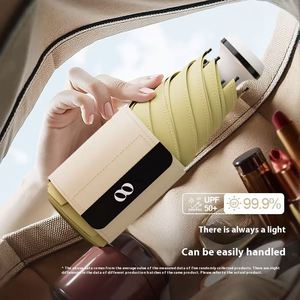 Sombrilla Portátil al por Mayor con Protección UV, Diseño de Cápsula Blanca, Manual, para Viajes, Lluvia y Sol, Opción de Compra - Product Image 2