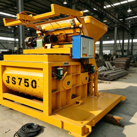 Mixer Beton JS750 Twin Shaft 750L 35m3/jam Warna Kuning dengan Panel Kontrol Digital dan Tombol Stop Darurat