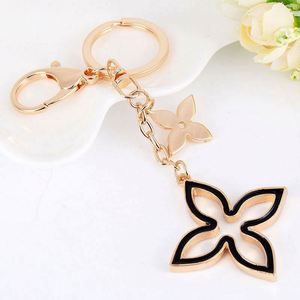 Llavero de Trébol con Cristales Brillantes y Pedrería, Hermoso Llavero de Metal con Trébol, Colgante de Moda para Bolsos de Mujer - Product Image 5