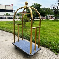 Chariot à bagages de luxe moderne en acier inoxydable pour hall d'hôtel, avec 4 roues et 3 étagères, idéal pour aéroports et concierges