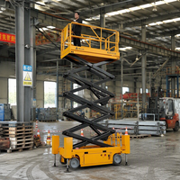 Plateforme élévatrice à ciseaux électrique sur chenilles en acier de 14 m GS1212TL, capacité de 450 kg, avec extension de 900 mm pour la construction d'installations