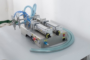 Remplisseuse quantitative semi-automatique à 2 buses LK-2DYT500 haute précision à alimentation automatique pour lait et jus - Product Image 2