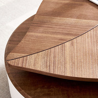 Table basse en bois au design unique, forme de feuille spéciale, moderne et créative, avec placage en noyer et structure en métal
