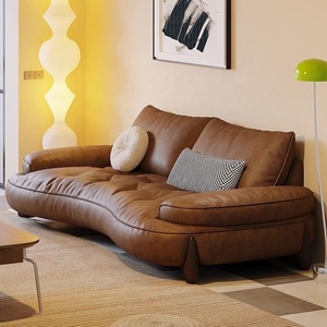Canapé sectionnel en cuir de vachette pleine fleur de style italien, avec dossier segmenté et assise rembourrée, idéal pour villas haut de gamme et résidences familiales - Product Image 1