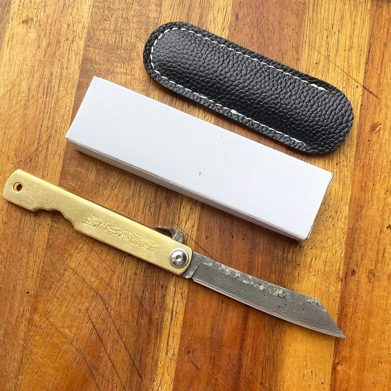 Brass handle Damascus