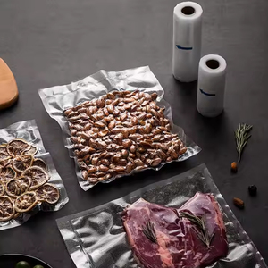 Sacs de scellage <span class=keywords><strong>sous</strong></span> <span class=keywords><strong>vide</strong></span> en relief texturés transparents/noirs emballage PET/PE de qualité alimentaire pour le riz autres aliments économiseur de nourriture en plastique - Product Image 1