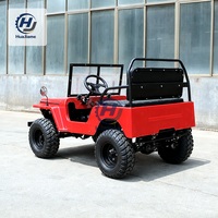 Buggy utilitaire avec finition rouge et noire, pare-brise, roue de secours arrière et carrosserie ouverte pour passager