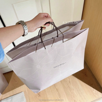 Sac de shopping personnalisé en papier d'art durable de luxe avec poignée torsadée, sac de transport pour boutique, pour vêtements, chaussures, cadeaux, emballage de vente au détail
