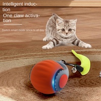 Jouet interactif moderne pour animaux de compagnie : Balle électrique roulante automatique intelligente en silicone avec plumes pour chats actifs