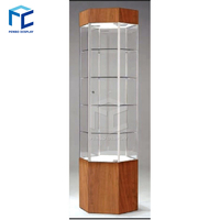 Vitrine rotative hexagonale avec éclairage, vitrine en verre électrique rotative pour l'affichage en magasin